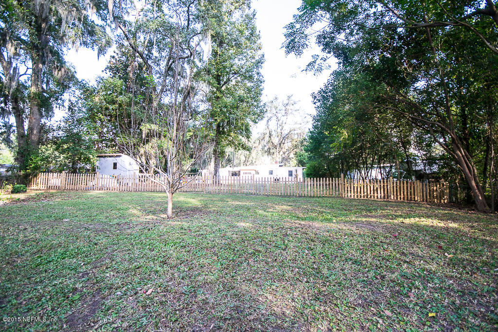 10504 Rutgers Road Jacksonville, FL 32218 - Photo 23 of 32 a view of a trees in a yard
