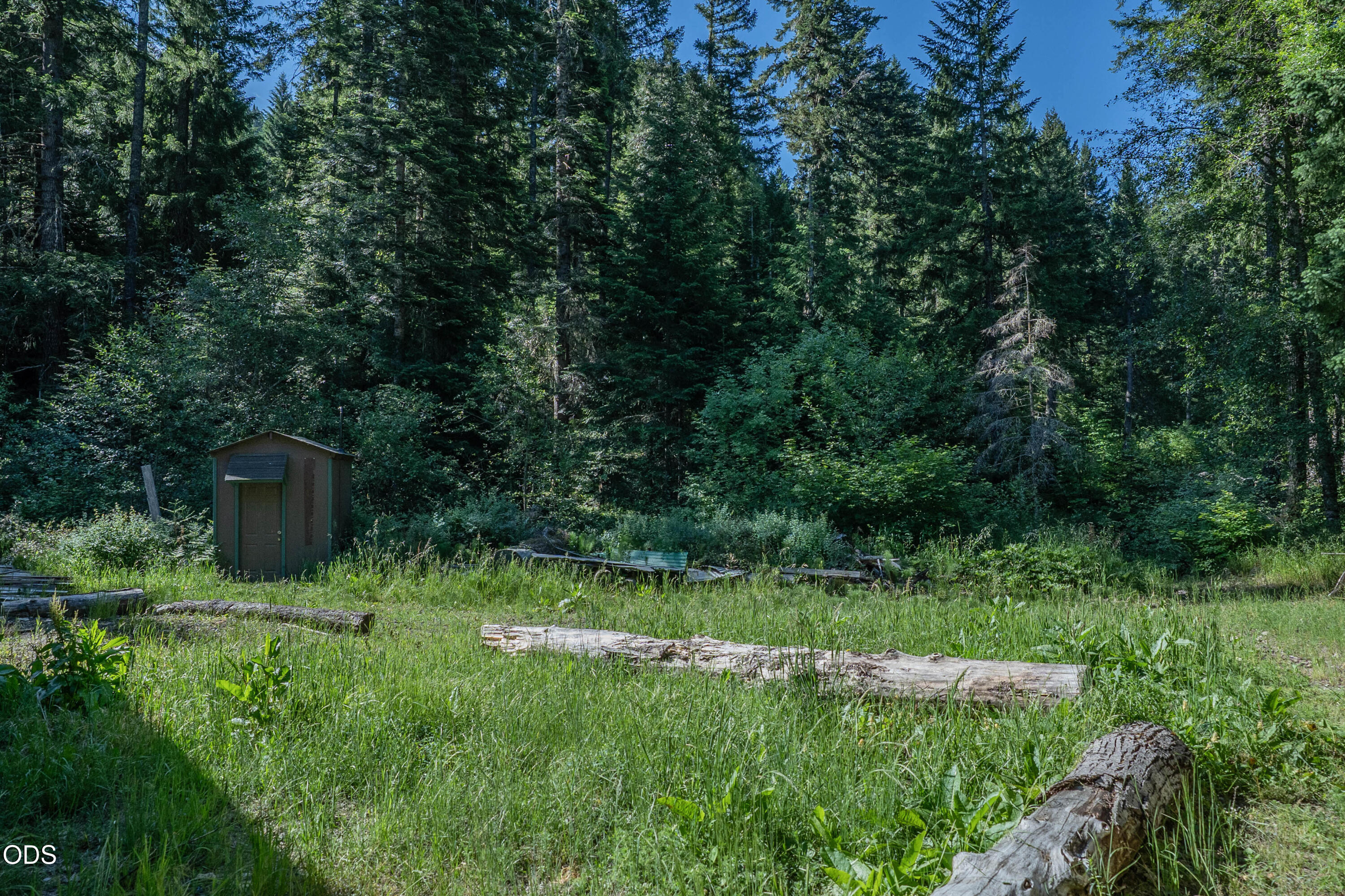 8245 Jumpoff Joe Creek Road Grants Pass, OR 97526 - Photo 28 of 43 a view of a wooden fence