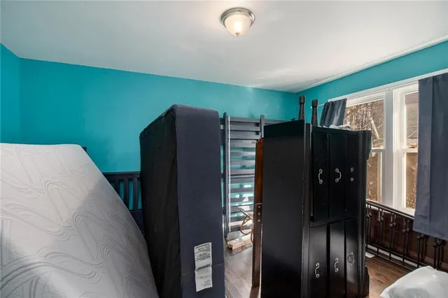 a bathroom with a shower and a sink