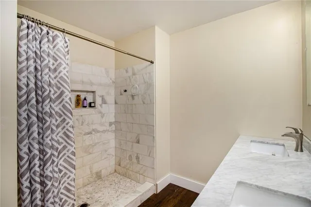 a bathroom with a sink and vanity