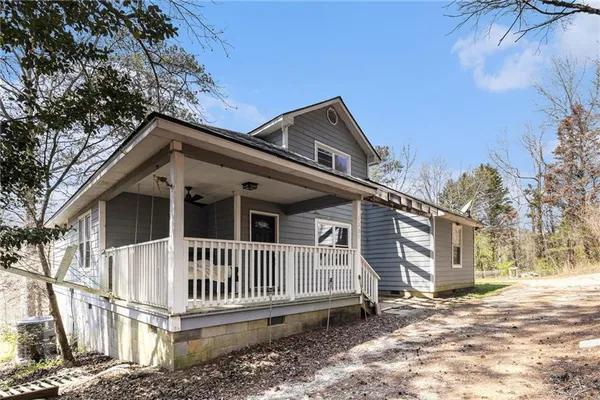 a view of a house with a roof deck