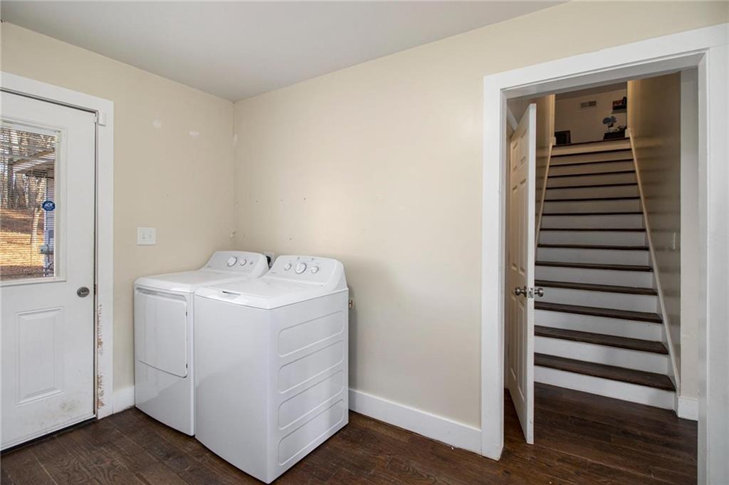 1585 Golden Pond Road Buchanan, GA 30113 - Photo 22 of 30 a utility room with dryer and washer