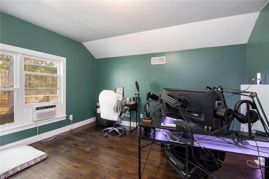 1585 Golden Pond Road Buchanan, GA 30113 - Photo 23 of 30 a living room with furniture and a wooden floor