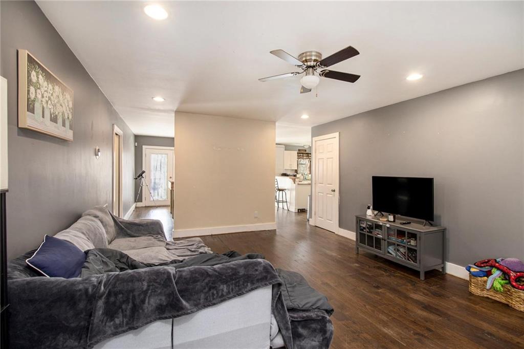 1585 Golden Pond Road Buchanan, GA 30113 - Photo 4 of 30 a bedroom with a bed and a flat screen tv