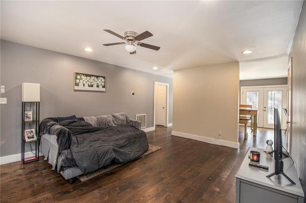 1585 Golden Pond Road Buchanan, GA 30113 - Photo 5 of 30 a living room with furniture and a flat screen tv