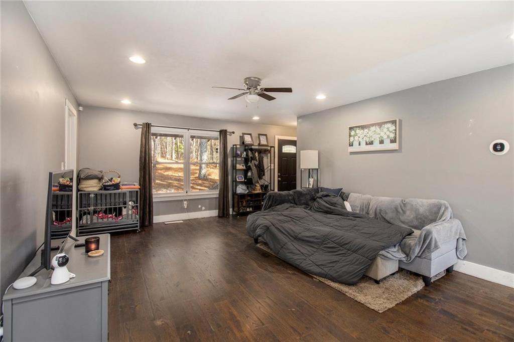 1585 Golden Pond Road Buchanan, GA 30113 - Photo 6 of 30 a living room with furniture and a flat screen tv