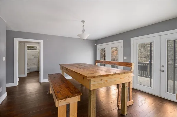 a kitchen with stainless steel appliances granite countertop a stove and a refrigerator