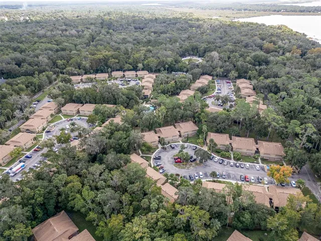 an aerial view of a houses with a outdoor space