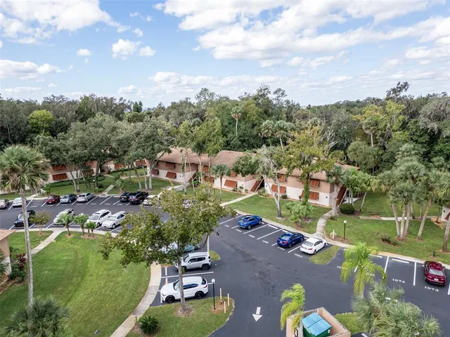an aerial view of a house with a garden