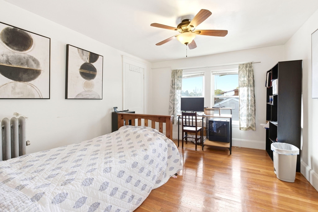 58 Bayfield Road Quincy, MA 02171 - Photo 11 of 27 a bedroom with a bed a couch and dresser