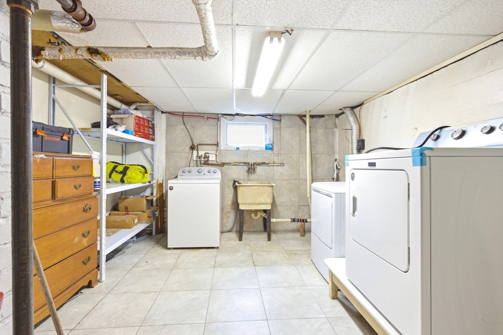 58 Bayfield Road Quincy, MA 02171 - Photo 18 of 27 a utility room with dryer and washer