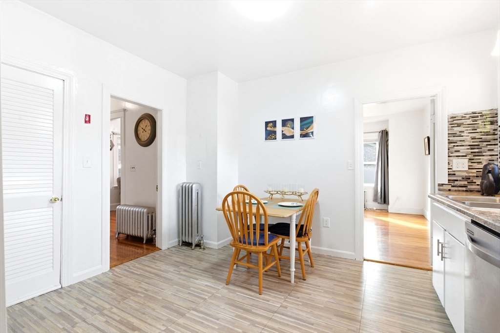 58 Bayfield Road Quincy, MA 02171 - Photo 7 of 27 a view of a dining room with furniture and wooden floor