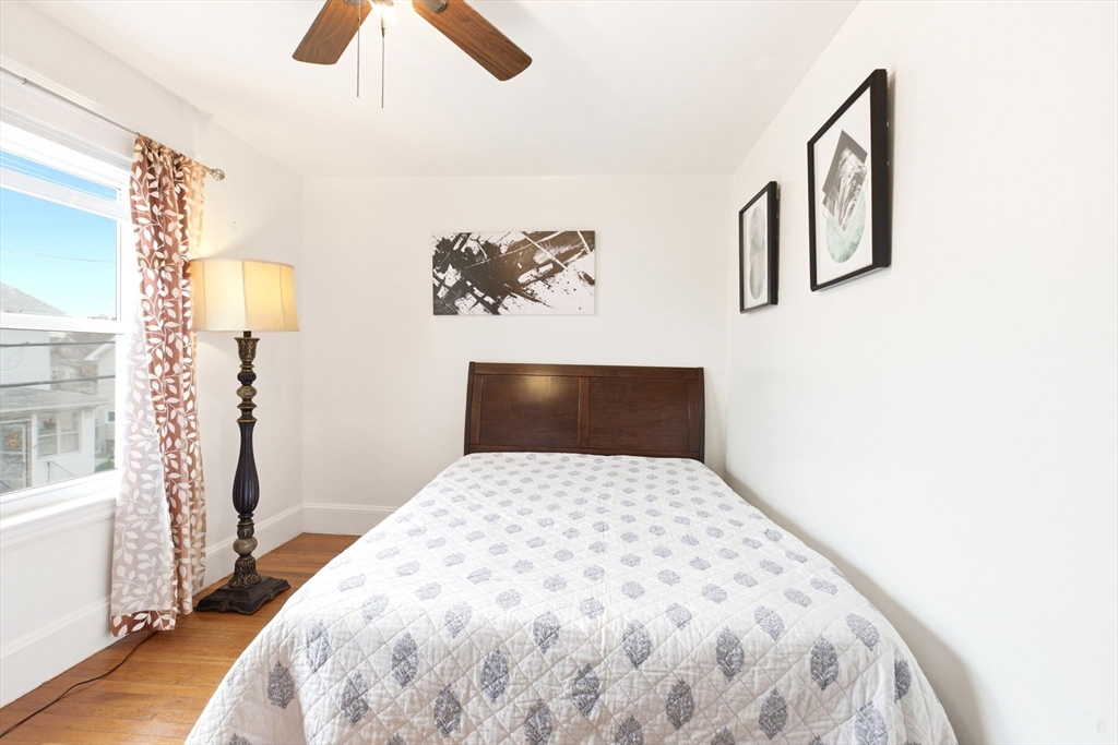 58 Bayfield Road Quincy, MA 02171 - Photo 10 of 27 a large bed sitting in a bedroom next to a window