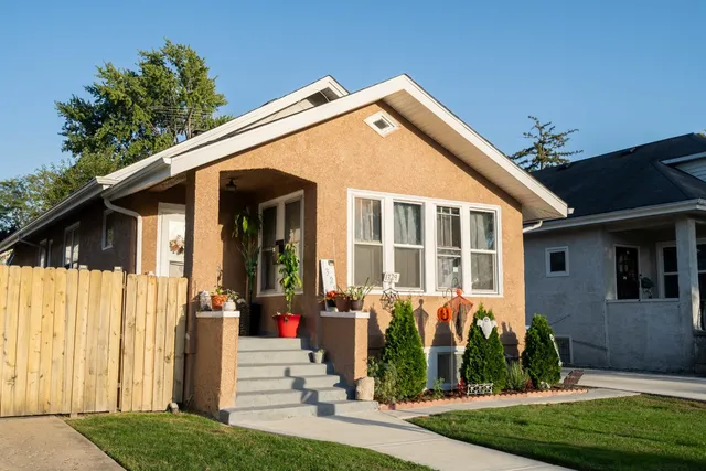 a front view of a house with a porch