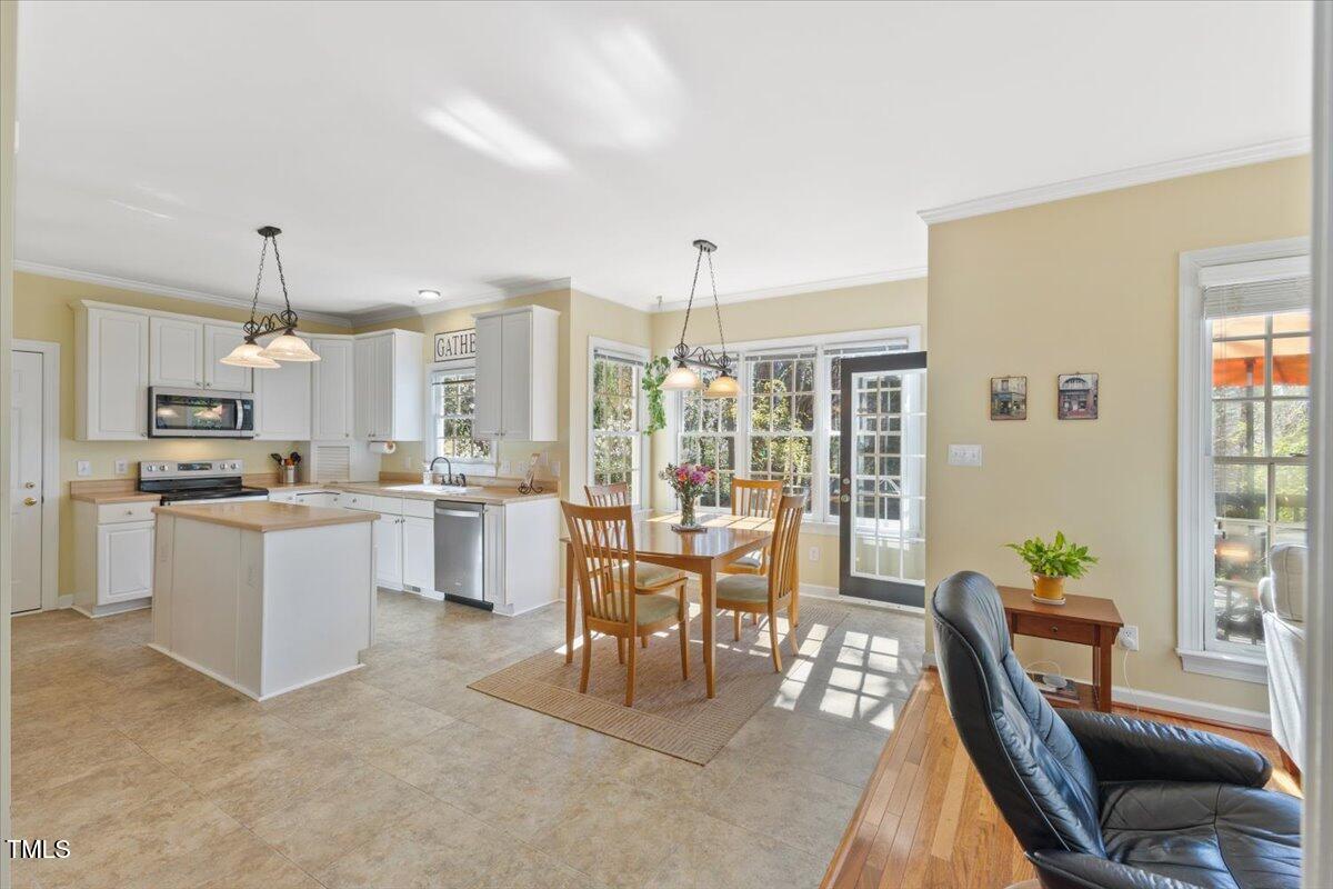 4617 Wee Burn Trail Raleigh, NC 27612 - Photo 11 of 70 Family Room to Kitchen