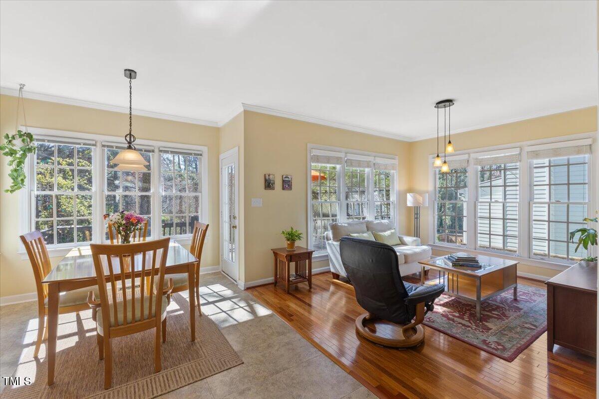 4617 Wee Burn Trail Raleigh, NC 27612 - Photo 13 of 70 a living room with furniture and large windows
