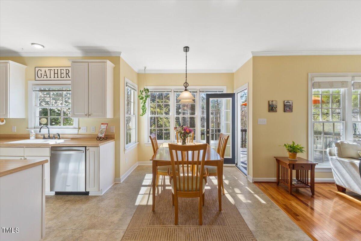 4617 Wee Burn Trail Raleigh, NC 27612 - Photo 20 of 70 a view of a dining room with furniture window and outside view