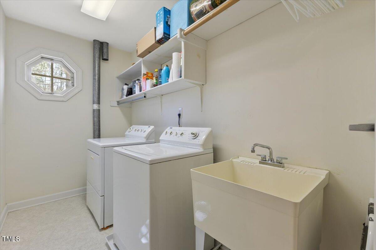 4617 Wee Burn Trail Raleigh, NC 27612 - Photo 54 of 70 a utility room with dryer and washer