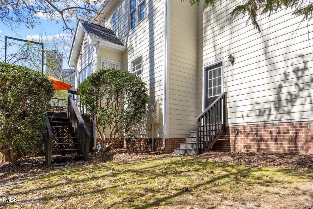 4617 Wee Burn Trail Raleigh, NC 27612 - Photo 58 of 70 a view of a house with a yard