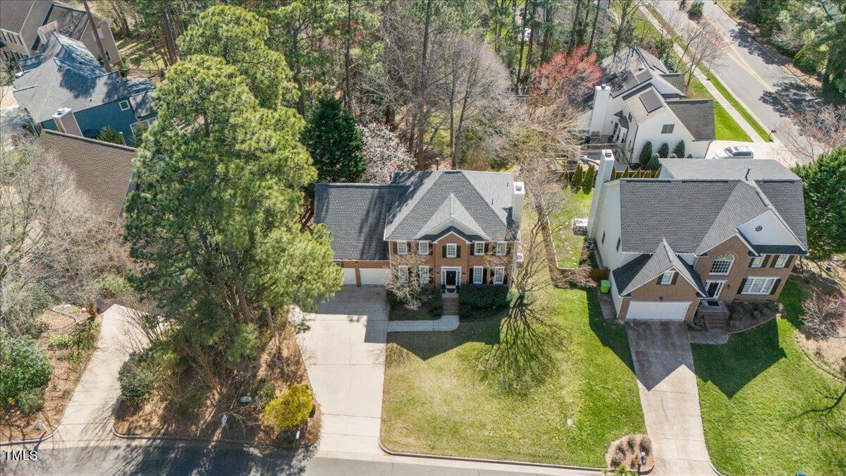 4617 Wee Burn Trail Raleigh, NC 27612 - Photo 65 of 70 an aerial view of a house with swimming pool and outdoor seating