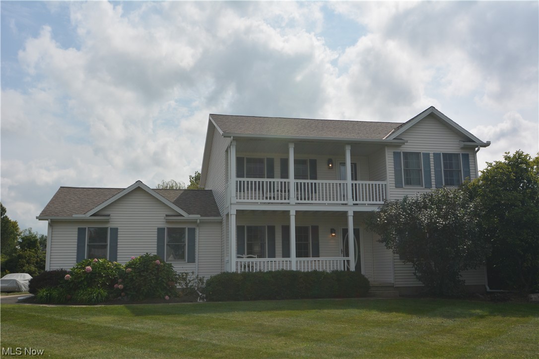 12014 West Lake Road Vermilion, OH 44089 - Photo 3 of 35 View of front with two balconies