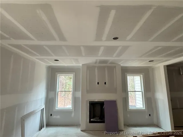 an empty room with windows