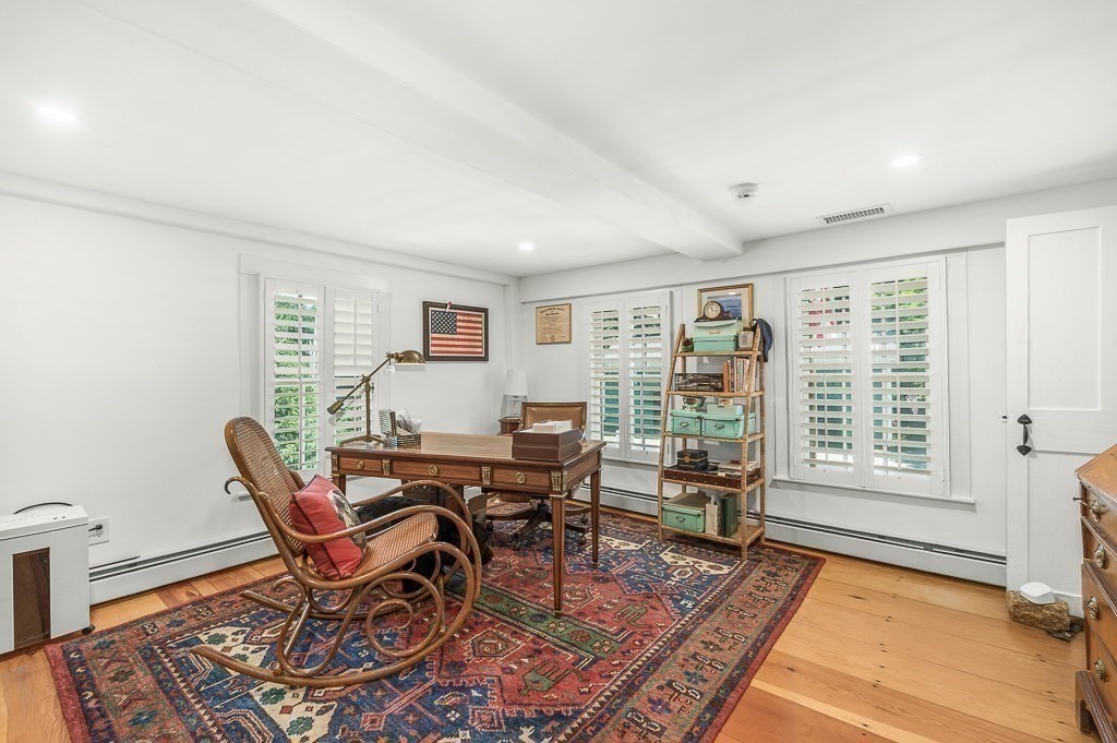 968 Bay Road Hamilton, MA 01982 - Photo 32 of 42 a view of a dining room with furniture window and wooden floor