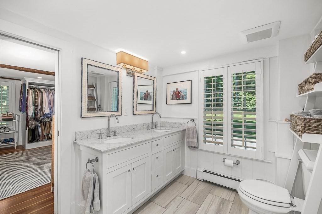 968 Bay Road Hamilton, MA 01982 - Photo 36 of 42 a spacious bathroom with 2 sink tub and a large mirror