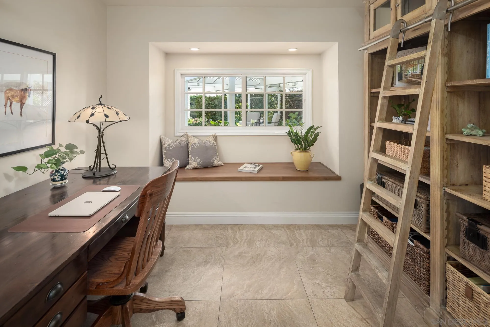5632 La Crescenta Road Rancho Santa Fe, CA 92067 - Photo 12 of 24 a living room with furniture and a potted plant