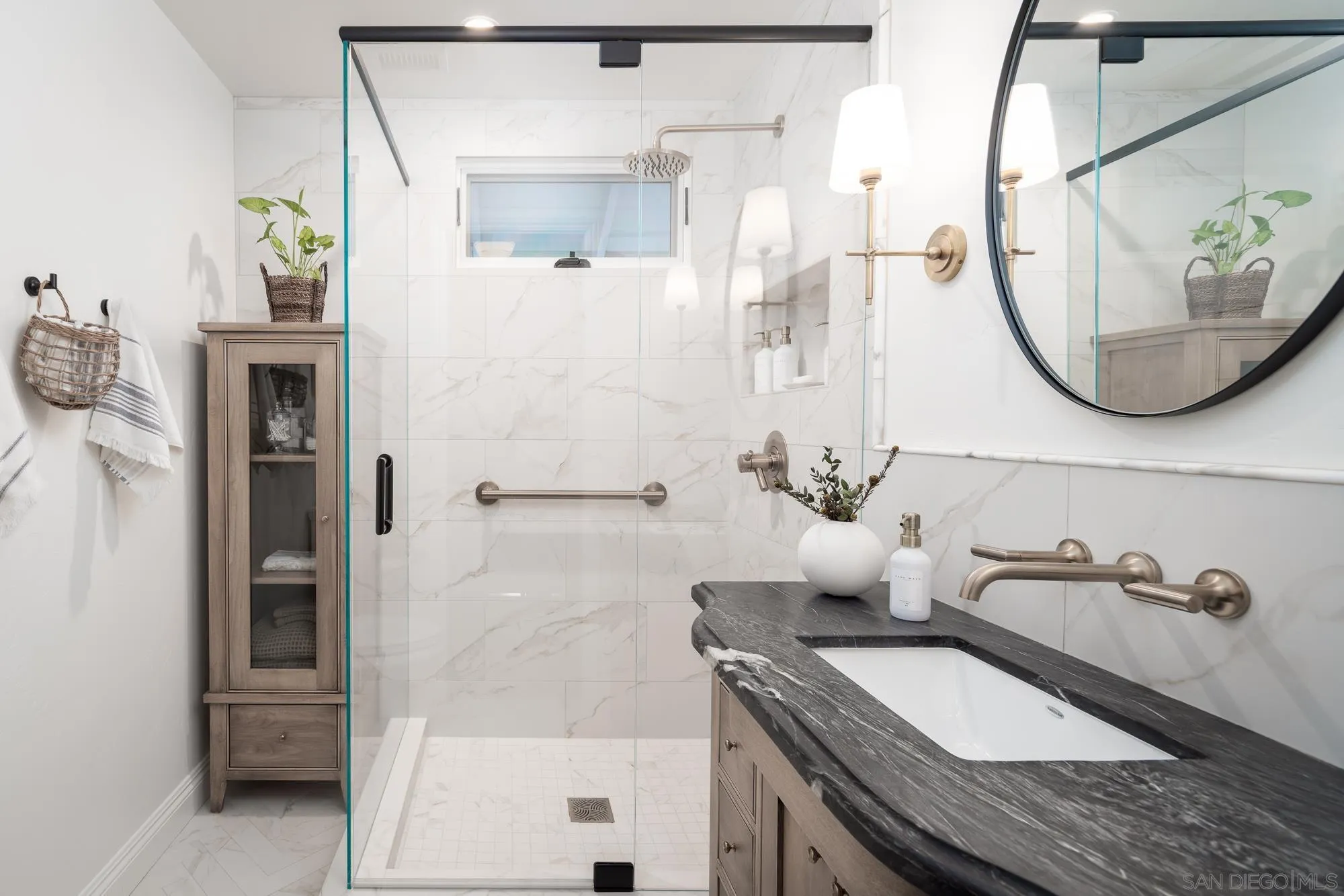 5632 La Crescenta Road Rancho Santa Fe, CA 92067 - Photo 14 of 24 a bathroom with a granite countertop sink a mirror and shower