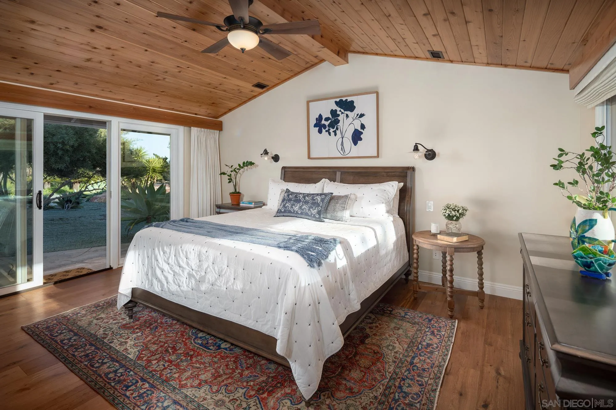 5632 La Crescenta Road Rancho Santa Fe, CA 92067 - Photo 15 of 24 a bedroom with large bed and a potted plant