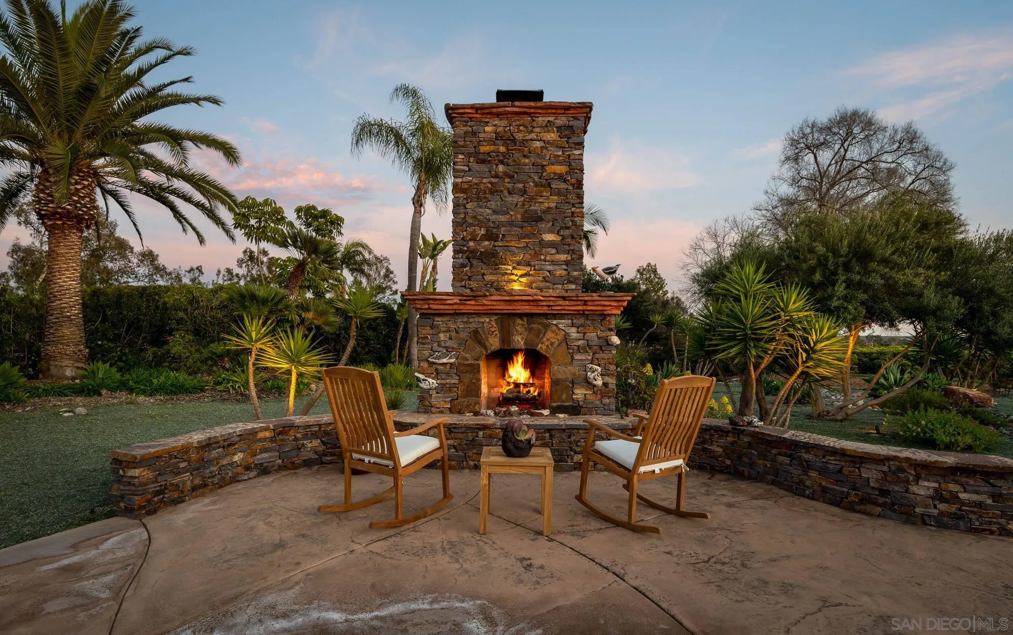 5632 La Crescenta Road Rancho Santa Fe, CA 92067 - Photo 4 of 24 a backyard of a house with table and chairs