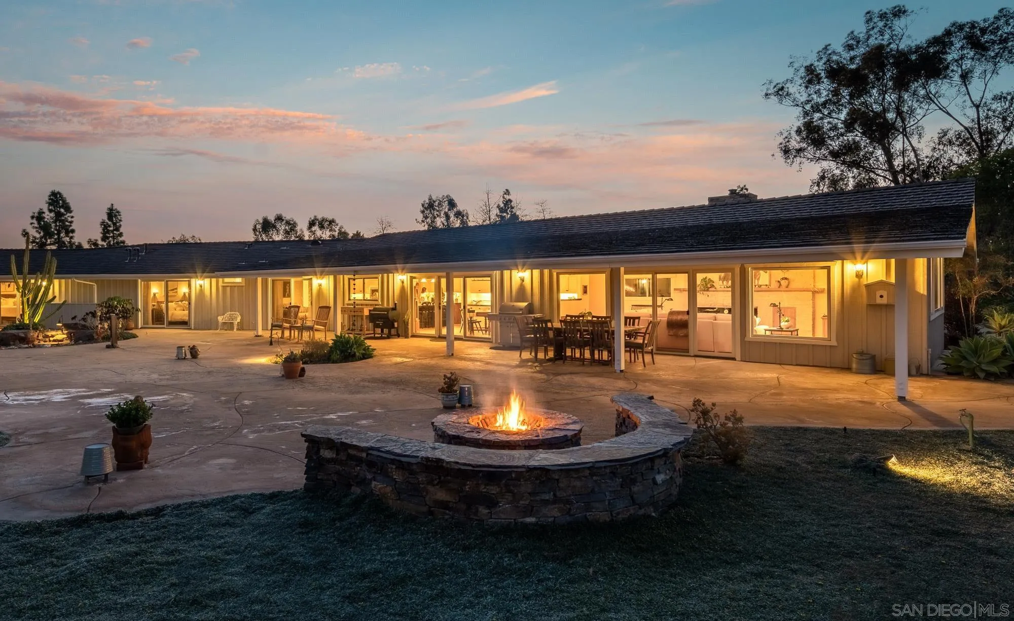 5632 La Crescenta Road Rancho Santa Fe, CA 92067 - Photo 5 of 24 a view of a swimming pool with a patio