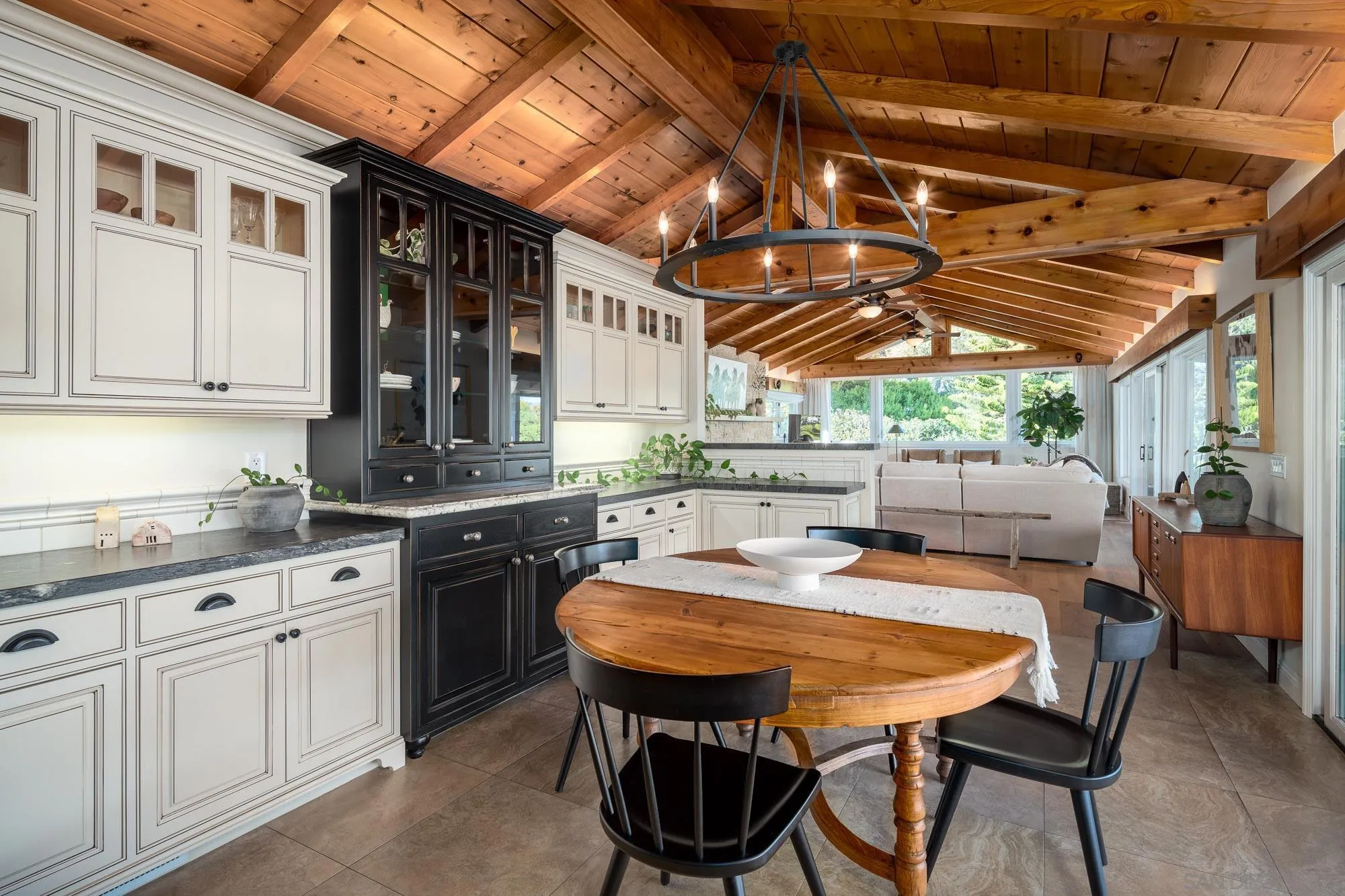 5632 La Crescenta Road Rancho Santa Fe, CA 92067 - Photo 9 of 24 a open kitchen with dining table and chairs