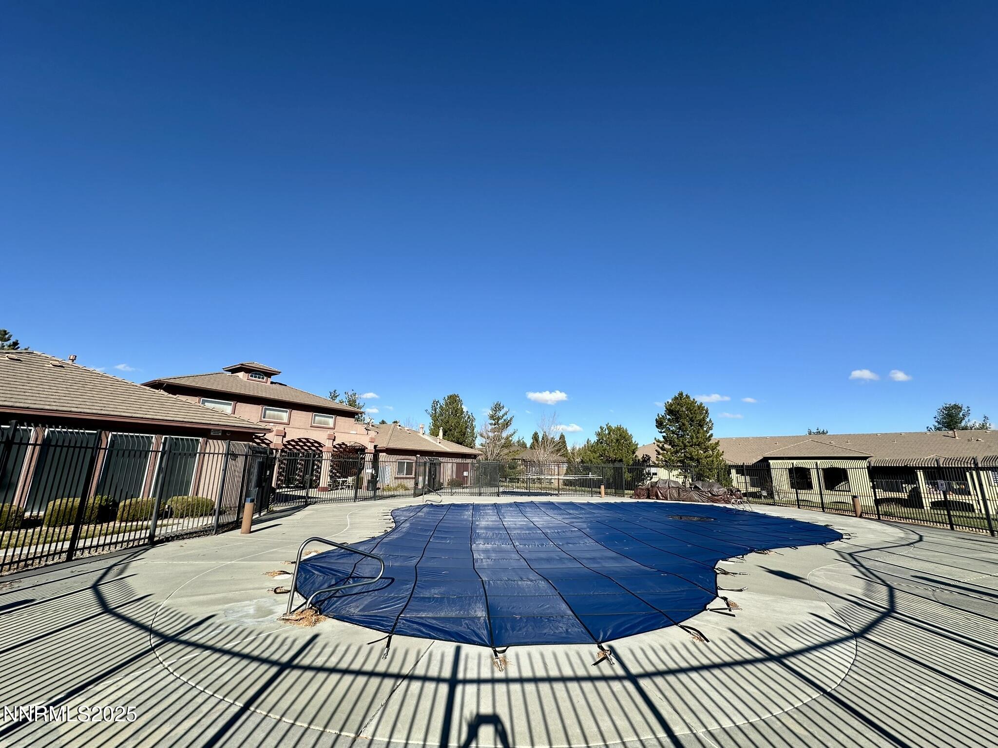 6850 Sharlands Avenue Reno, NV 89523 - Photo 23 of 25 a front view of a house with a yard