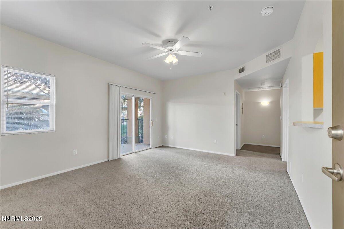 6850 Sharlands Avenue Reno, NV 89523 - Photo 5 of 25 a view of an empty room with a window