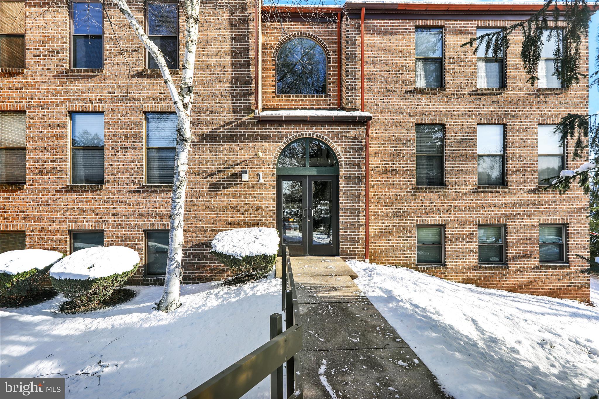 1 Olympic Drive Reading, PA 19607 - Photo 2 of 26 a front view of a house with parking area