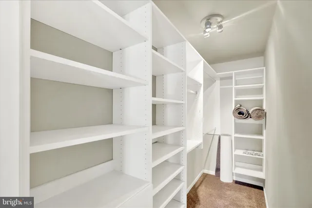 a view of empty room with lamp