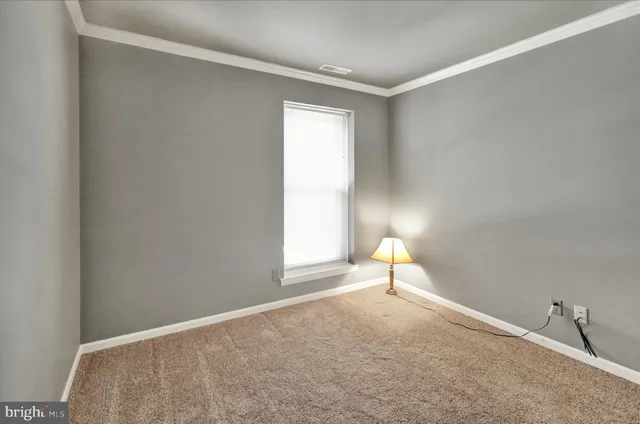 an empty room with sliding door