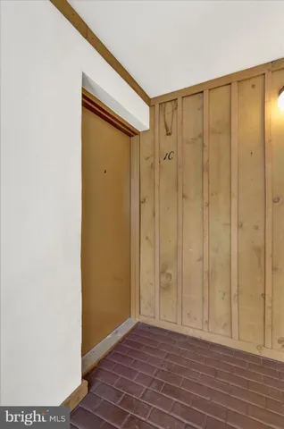 a view of a bathroom with wooden floor