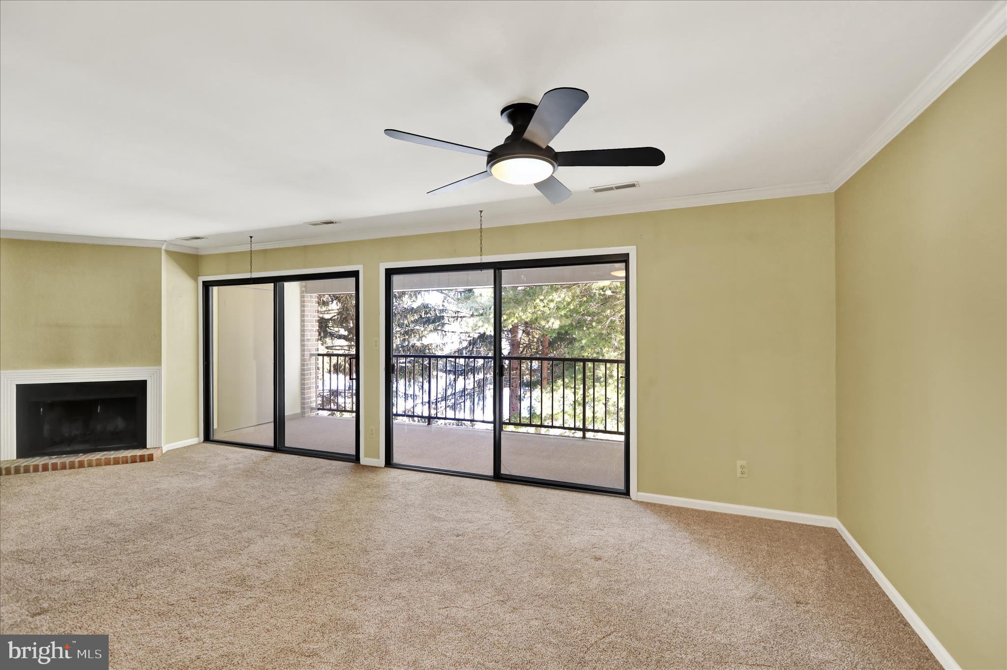 1 Olympic Drive Reading, PA 19607 - Photo 5 of 26 a view of an empty room with a fireplace and a window
