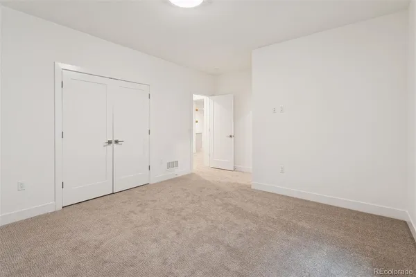 a view of a house with a snow in the yard