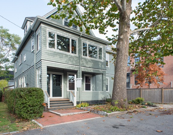 3 Wilson Avenue, Unit 2 Cambridge, MA 02140 - Photo 1 of 17 a front view of a house with a yard