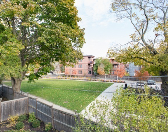 3 Wilson Avenue, Unit 2 Cambridge, MA 02140 - Photo 17 of 17 a view of a garden with houses