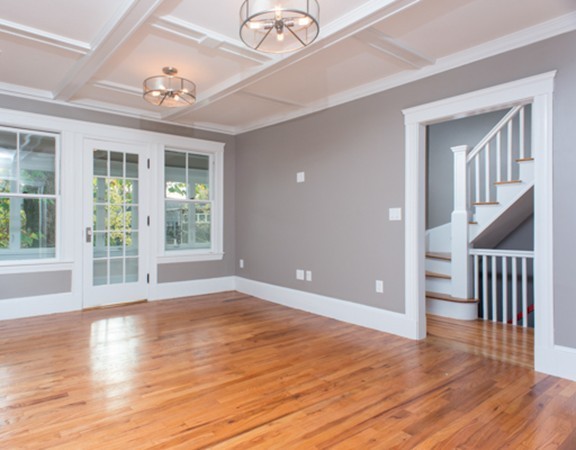 3 Wilson Avenue, Unit 2 Cambridge, MA 02140 - Photo 3 of 17 a view of an empty room with wooden floor and a window