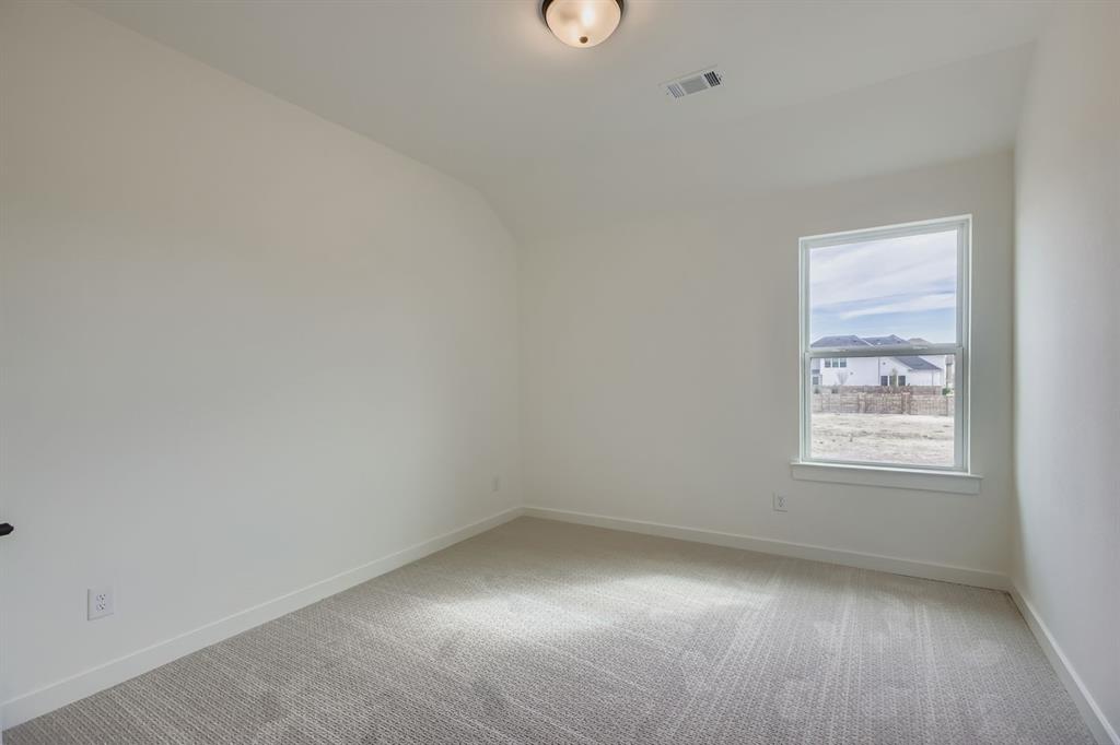 2204 Berman Street Celina, TX 75009 - Photo 18 of 28 an empty room with a window