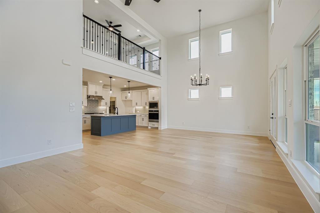2204 Berman Street Celina, TX 75009 - Photo 6 of 28 a view of a kitchen with a sink and cabinets