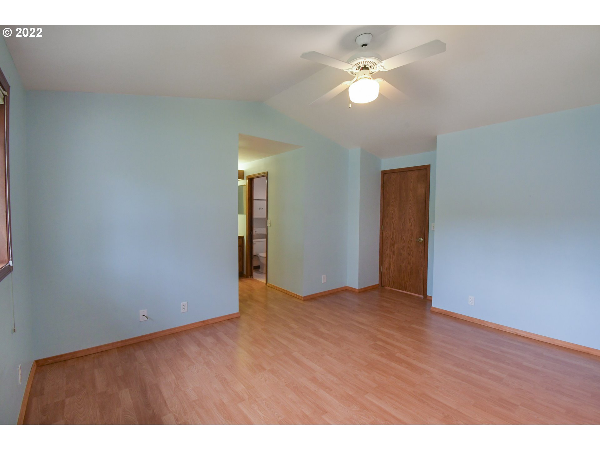 3925 Pearl Street Eugene, OR 97405 - Photo 12 of 21 a view of an empty room with a ceiling fan