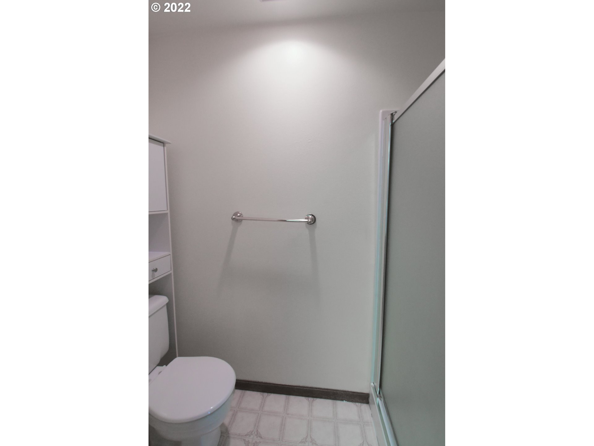 3925 Pearl Street Eugene, OR 97405 - Photo 14 of 21 a bathroom with a toilet and a shower