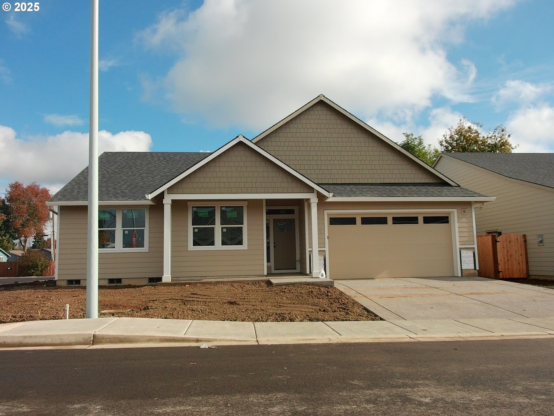 405 South Cedar Street Yamhill, OR 97148 - Photo 2 of 36 a front view of a house with a yard